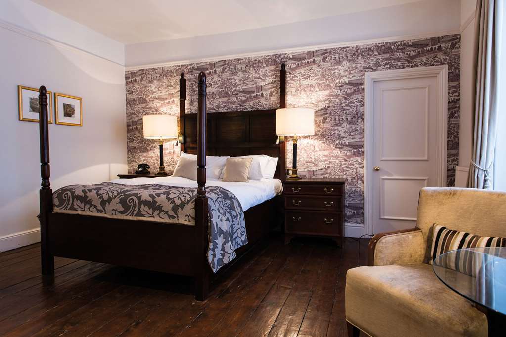 The Fleece At Сайърънсестър Стая снимка A bedroom at the hotel